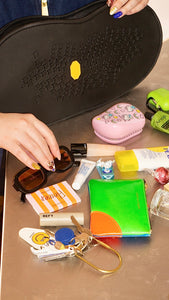 “Get a grip” clutch bag